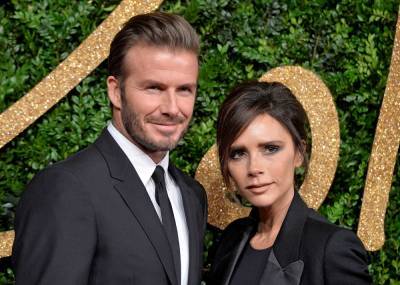 David Beckham Touches Up Victoria Beckham’s Makeup During Photoshoot - etcanada.com