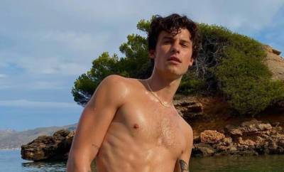 Shawn Mendes Goes Shirtless in Spain, Flaunts Body in Short Swim Trunks - www.justjared.com - Spain