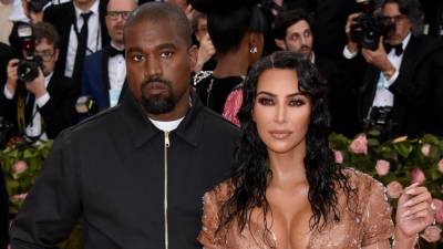 Kim Kardashian Turns Heads in Black Bondage-Style Look While Supporting Ex Kanye West at 'Donda' Event - www.etonline.com - Atlanta - Indiana