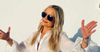 Laura Whitmore makes surprise visit to Love Island in stunning white outfit - www.ok.co.uk - county Love