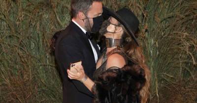 Jennifer Lopez and Ben Affleck kiss through face masks at 2021 Met Gala - www.msn.com - New York
