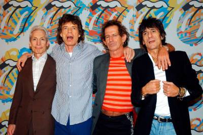 Rolling Stones miss Charlie Watts’ funeral over COVID-19 restrictions - nypost.com - Britain - USA - county Stone - Boston
