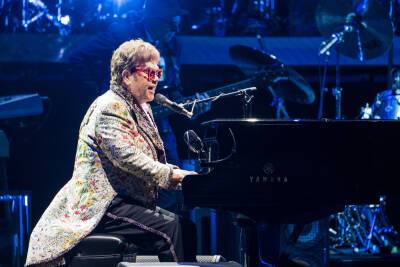 Elton John finally returns to stage 2 years after hip surgery, COVID-19 delays - nypost.com - Australia - Britain - New Zealand - Los Angeles - New Orleans