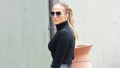 Jennifer Lopez Models Low-Cut Top High-Waisted Jeans To Wish Her Fans A ‘Happy Friday’ - hollywoodlife.com