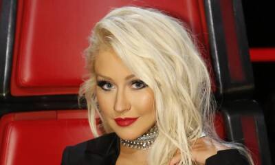 Christina Aguilera pulls off her most daring look yet - hellomagazine.com - Spain - city Santo