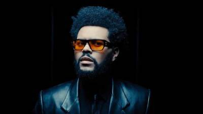 The Weeknd Leaps Past Justin Bieber and Breaks Record for Most Spotify Listeners - www.etonline.com