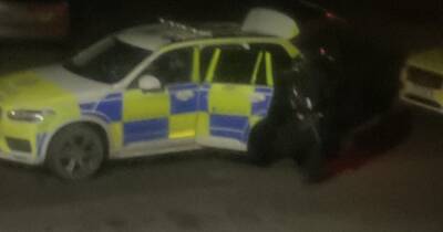 Armed cops lock down Scots street after early morning 'disturbance' in Buckie flat - www.dailyrecord.co.uk - Scotland - county Morrison