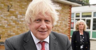 Tory MP says Boris Johnson was 'ambushed with a cake' over party claims - www.manchestereveningnews.co.uk - Manchester - Ireland