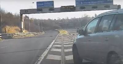 Terrifying moment driver nearly smashes into police car after cutting across M66 in 100mph chase - www.manchestereveningnews.co.uk - Manchester