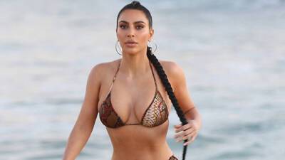 Kim Kardashian Catches Rays In Hot Pink Bikini As She ‘Spams Vacay Pics’ On IG - hollywoodlife.com - county Ray