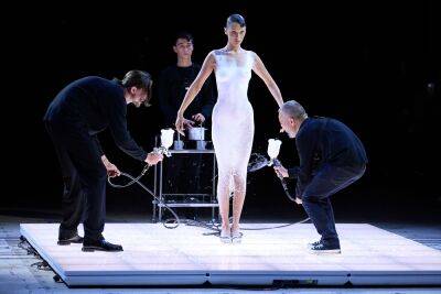 A Dress Was Spray-Painted Onto Bella Hadid’s Body During Paris Fashion Week - etcanada.com - Iran