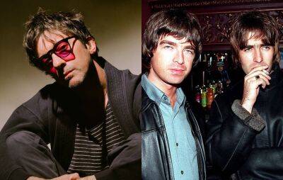 Blur’s Graham Coxon says he’d be happy to get Oasis back together: “I’d have a chat with them” - www.nme.com