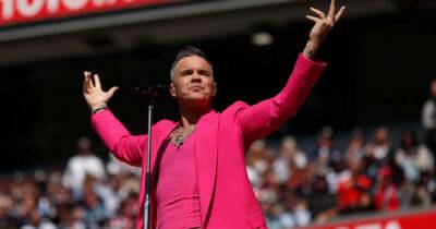 Robbie Williams ‘joked being flashed by female fan on first night of new tour made him feel like “diabetic in cake shop”’ - www.msn.com - Britain