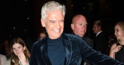 Philip Schofield pictured beaming as he parties after Holly Willoughby's early NTAs exit - www.ok.co.uk