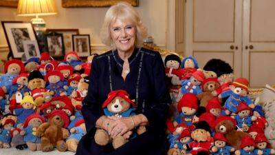 Camilla, Queen Consort Poses With Hundreds of Teddy Bears Left in Tribute to Queen Elizabeth - www.etonline.com - Britain - county Hyde