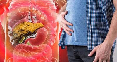 Swollen tummy could be a sign of fatty liver disease - caused by fluid build-up - www.msn.com