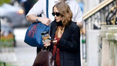 Mary-Kate Olsen Aces Another High-Low Look With Affordable Shoes - www.glamour.com - Adidas