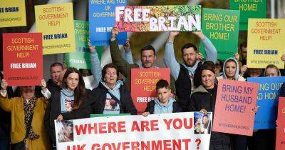 Family of Scots dad jailed in Iraq protest outside Holyrood demanding action to bring him home - www.dailyrecord.co.uk - Britain - Scotland - Qatar - Iraq