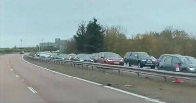 Scots motorists face ‘giant car park’ on M90 as traffic queues for 13 miles with 60 minute delays - www.dailyrecord.co.uk - Scotland