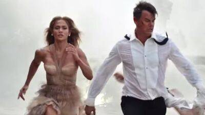 Jennifer Lopez and Josh Duhamel Team Up and Kick Pirate Booty in 'Shotgun Wedding' Trailer - www.etonline.com