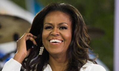 Michelle Obama looks happy and radiant in stunning beach photo - hellomagazine.com