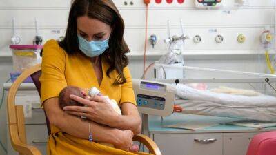 Kate Middleton Holds Newborn Baby and Offers Support to Moms During Visit to Maternity Hospital - www.etonline.com