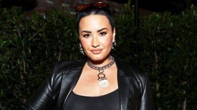 Demi Lovato Postpones 'Holy Fvck' Tour Date After Losing Her Voice - www.etonline.com - Chicago