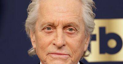 Michael Douglas looks unrecognisable as he dons brand new look with auburn hair - www.dailyrecord.co.uk
