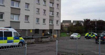 Two men found dead at Scots high-rise flat as cops tape off scene - www.dailyrecord.co.uk - Scotland