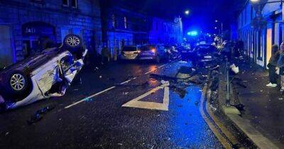 Car flipped on roof in Scots town after horror multi-vehicle smash - www.dailyrecord.co.uk - Scotland