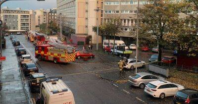 Scots woman rescued from flat fire by hero crews as street closed off - www.dailyrecord.co.uk - Scotland - city Irvine