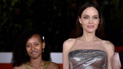 Angelina Jolie Tearfully Voices Support for Domestic Abuse Victims with Zahara By Her Side - www.etonline.com - Columbia