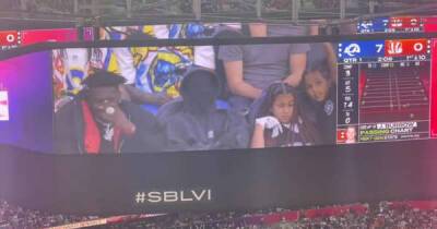 Kanye West is booed by crowd as he attends Super Bowl with his kids - www.msn.com
