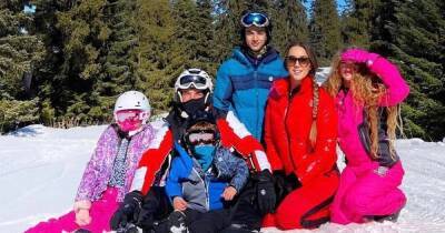 Peter and Emily Andre pose with all four kids for unique family ski photo - www.ok.co.uk - France - Bulgaria