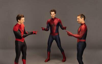 Tom Holland says one of the three Spider-Man stars in ‘No Way Home’ wore a fake bum - www.nme.com