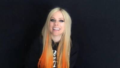 Avril Lavigne on Relating to Olivia Rodrigo and Working With Travis Barker and Machine Gun Kelly (Exclusive) - www.etonline.com