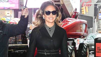 Jennifer Lopez Wears Cinched Black Coat Stilettos Walking Through Times Square In The Rain - hollywoodlife.com - New York - Manhattan - county Guthrie