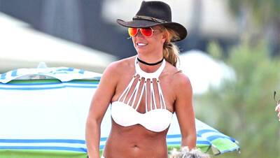 Britney Spears Rocks Pink Leopard Bikini As She Sunbathes With Sam Asghari — Photos - hollywoodlife.com - Hawaii