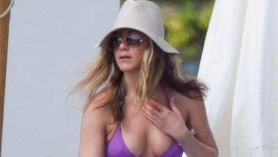 Jennifer Aniston Rocks Tiny Purple Bikini While Taking A Break From Filming In Hawaii — Photos - hollywoodlife.com - Hawaii - city Sandler