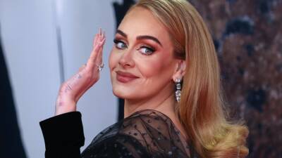 Adele's Massive Ring at BRIT Awards Sets Off Engagement Rumors - www.etonline.com - city Phoenix