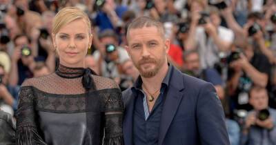 Like Charlize Theron, I’ll accept Tom Hardy’s tattoos and annoying Instagram, but not lateness - www.msn.com