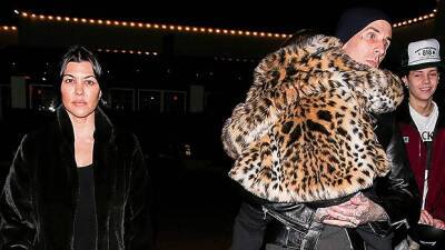 Travis Barker Sweetly Holds Reign, 7, On Malibu Dinner Date With Kourtney Kardashian - hollywoodlife.com