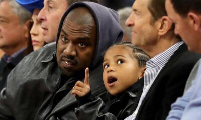 Kanye West takes son Saint to Warriors game amid his claims Kim K is keeping him from kids - us.hola.com - California - Boston - San Francisco, state California