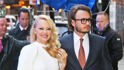 Pam Anderson Looks Stunning In High-Slit White Gown On The Arm Of Son Brandon In NYC - hollywoodlife.com - Chicago