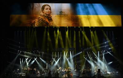 Watch Hans Zimmer play ‘Wonder Woman’ theme with Ukrainian orchestra at London’s O2 Arena - www.nme.com - Britain - Ukraine
