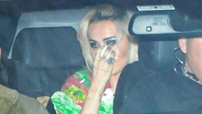 Miley Cyrus Appears to Wipe Away Tears In SUV As She Heads To Brazil Performance: Photos - hollywoodlife.com - Brazil - Los Angeles - Argentina - Colombia - city Bogota, Colombia