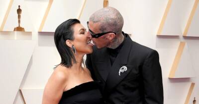 Kourtney Kardashian and Travis Barker pack on PDA and passionately kiss on Oscars red carpet - www.ok.co.uk - Hollywood