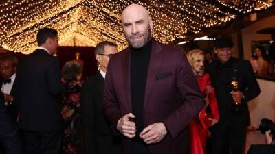 John Travolta Adopts Dog Jamie Lee Curtis Held Onstage at the Oscars - www.etonline.com