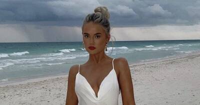 Molly-Mae Hague sends fans wild after posing in ‘wedding dress’ on beach - www.ok.co.uk - Mexico - Hague