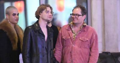 Alan Carr pictured holding hands with male friend as he lets his hair down after Paul Drayton split - www.ok.co.uk - London